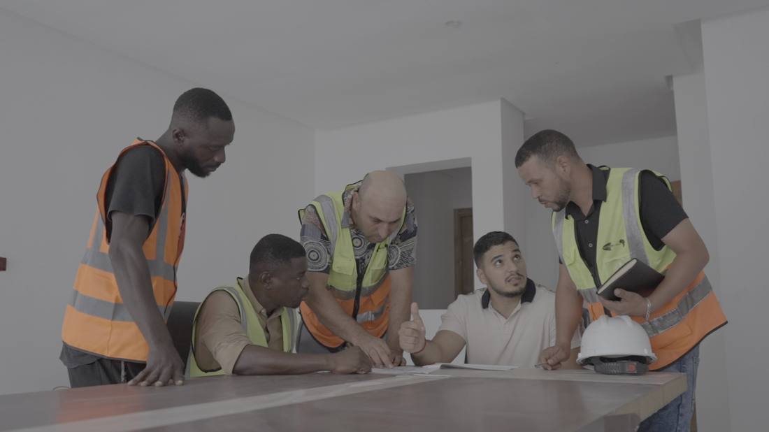 Site team reviewing plans